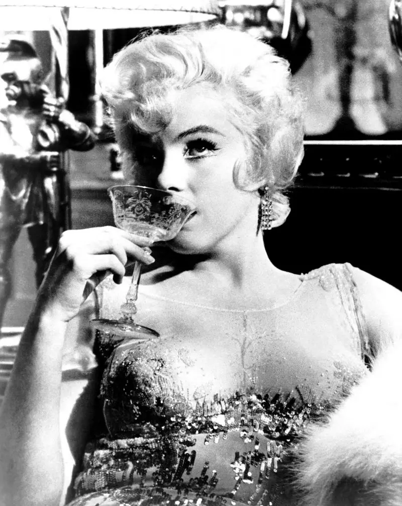 Marilyn Monroe sipping champagne