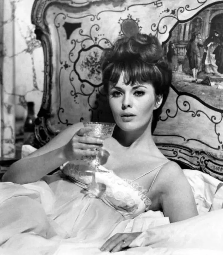 Jean Seberg sipping champagne