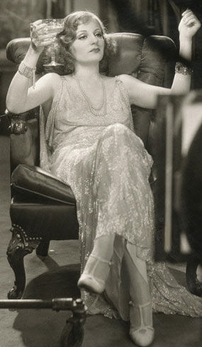 Tallulah Bankhead sipping champagne