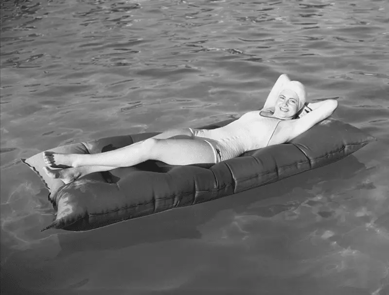 olivia de havilland afloat on a raft