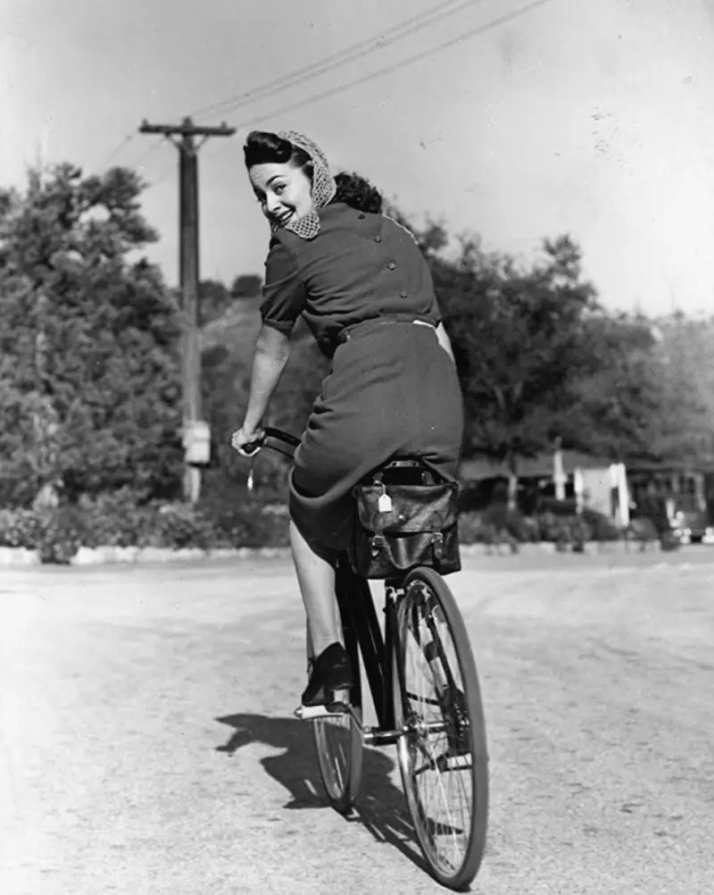 olivia de havilland on bicycle