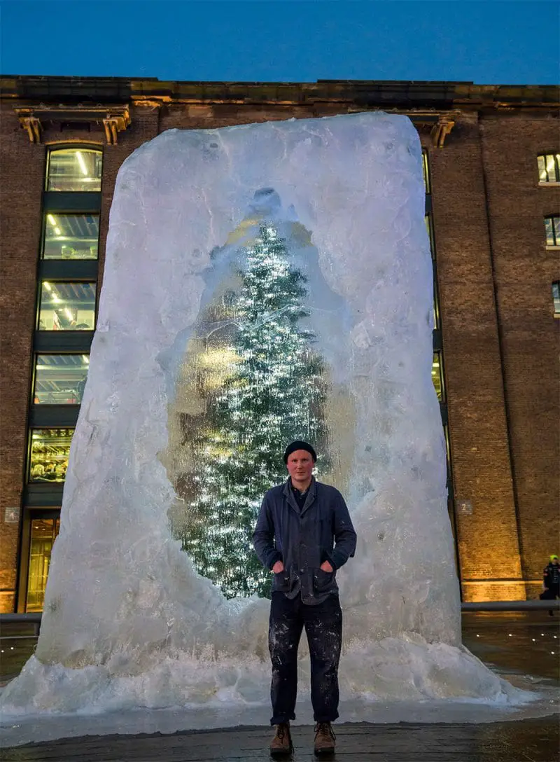 Artist alex chinnick in front of his tree