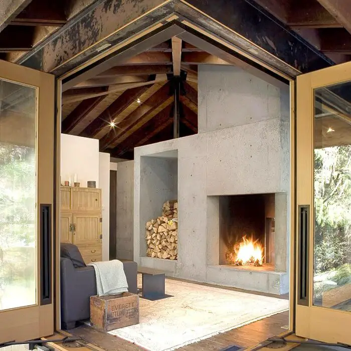 olsun kundig ty river cabin fireplace