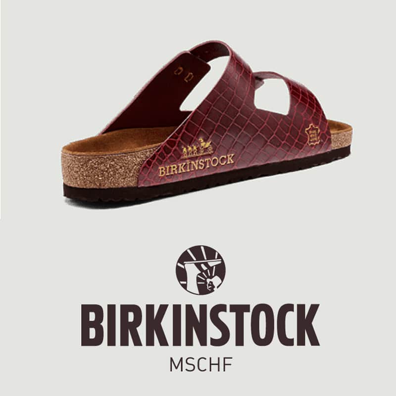 burgundy birkinstock with MSCHF logo