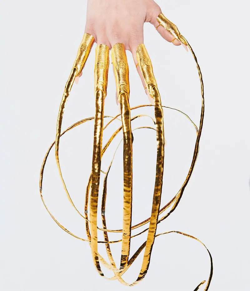 schiaparelli long gold nails