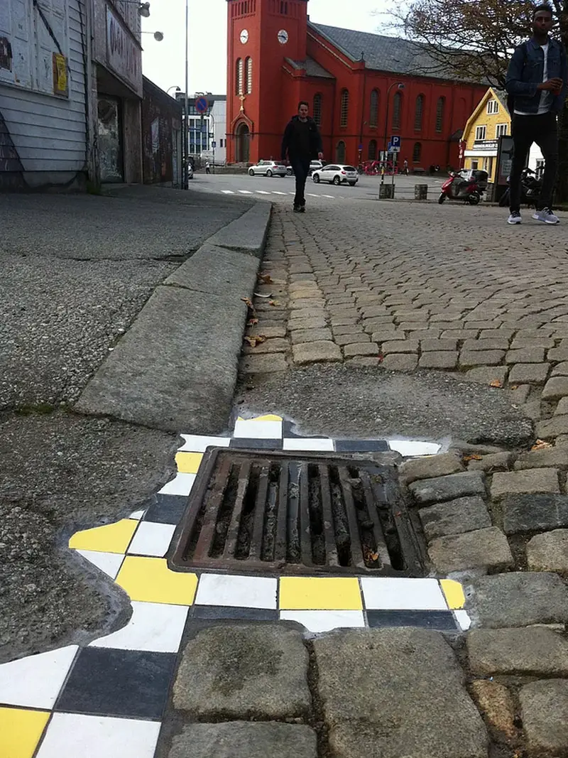 tiling around street grate