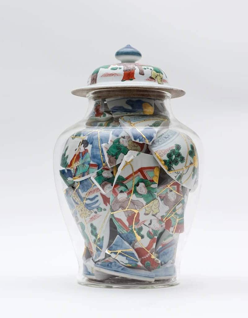 pottery shards in glass containers