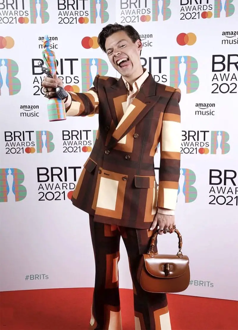 harry styles patchwork suit and handbag 2021 brit awards