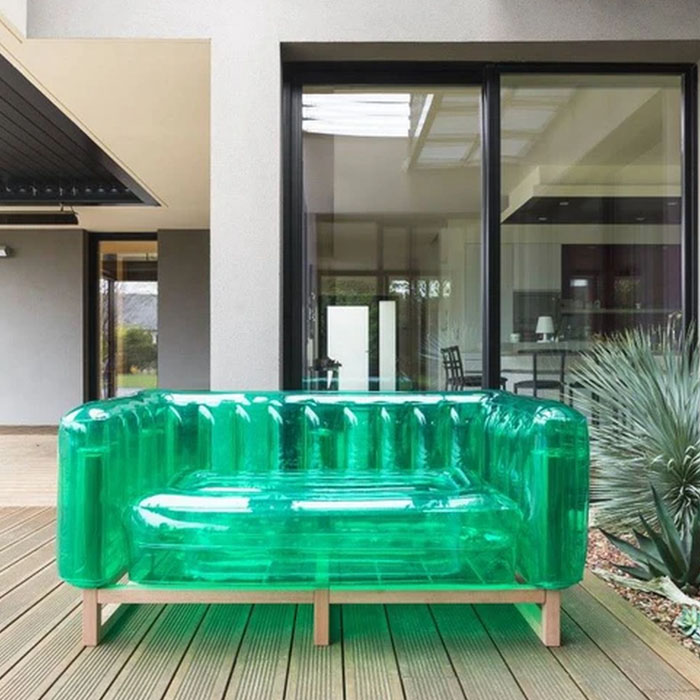 green inflatable sofa outdoors