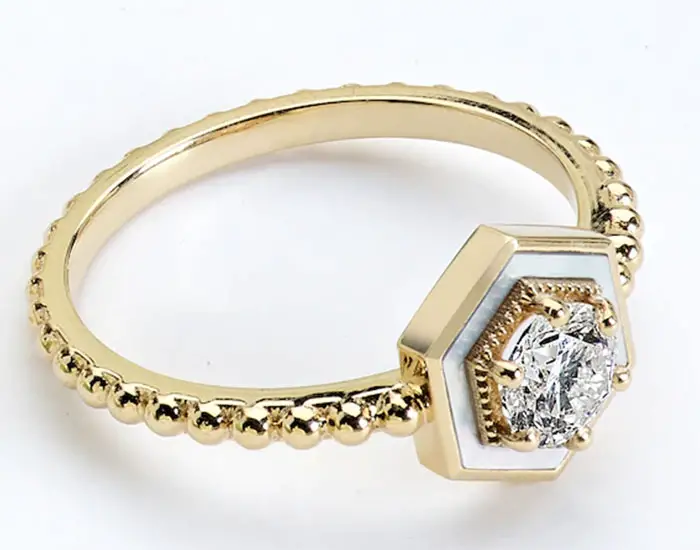 Harwell-Godfrey-Motu ring