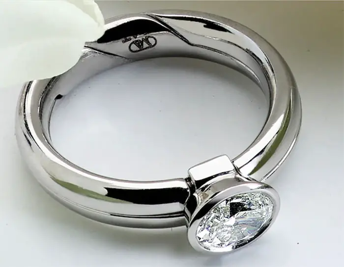 Marla Aaron's "DiMe Siempre" ring, platinum and diamond