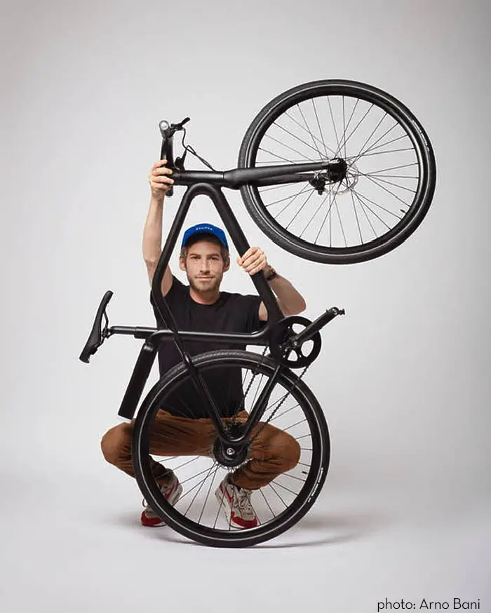 Industrial designer Ora Ito with his Angell electric bike