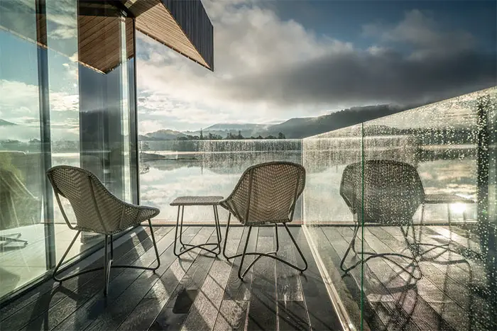 balcony and chairs at boathouse
