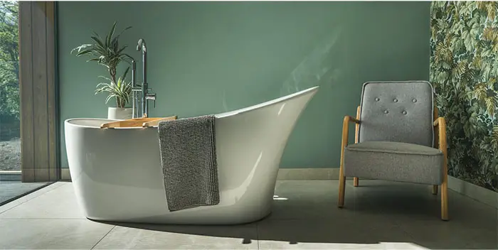 freestanding tub in bedroom
