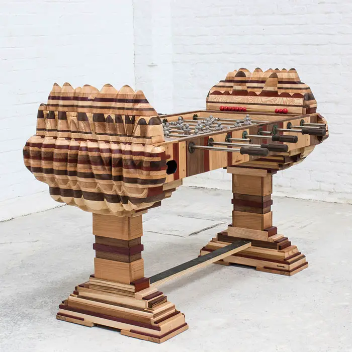 carved wood foosball table
