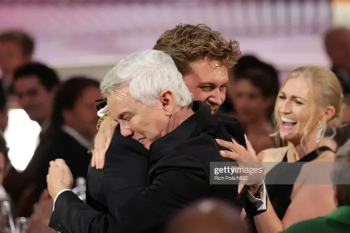 Actor Austin Butler (ELVIS) and Director Baz Luhrmann embrace