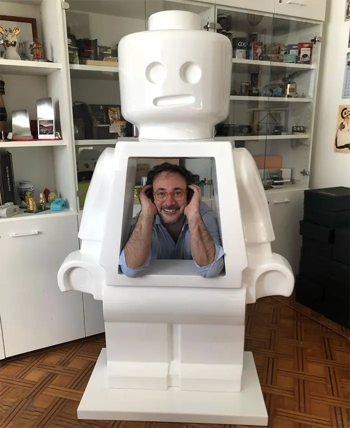 Artist Alessandro Piano in one of his giant brick Minifigs