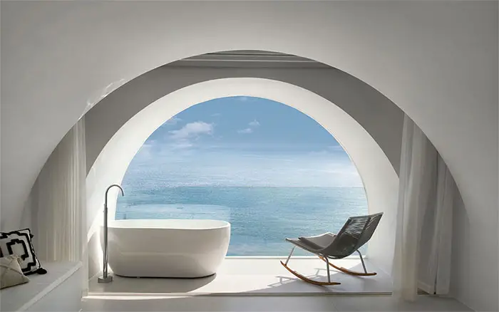 bath tub and rocker facing ocean