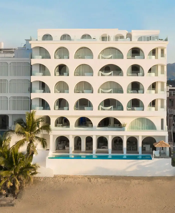 ocean front hotel with arched windows
