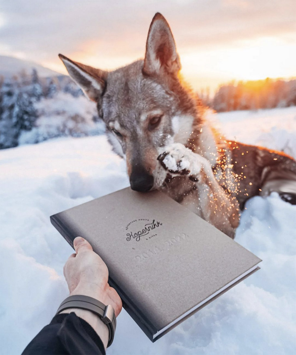 Sitka with his the adventure book