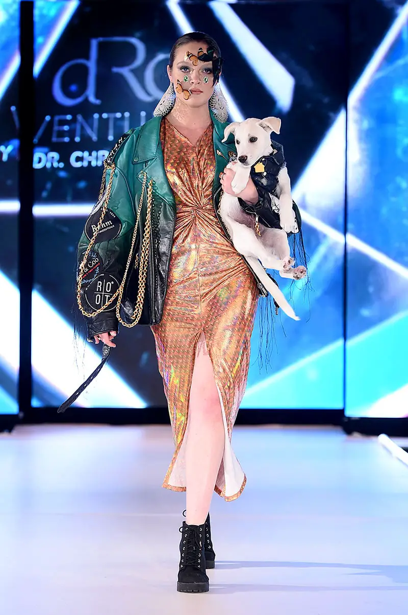 elysian impact runway show models with dogs