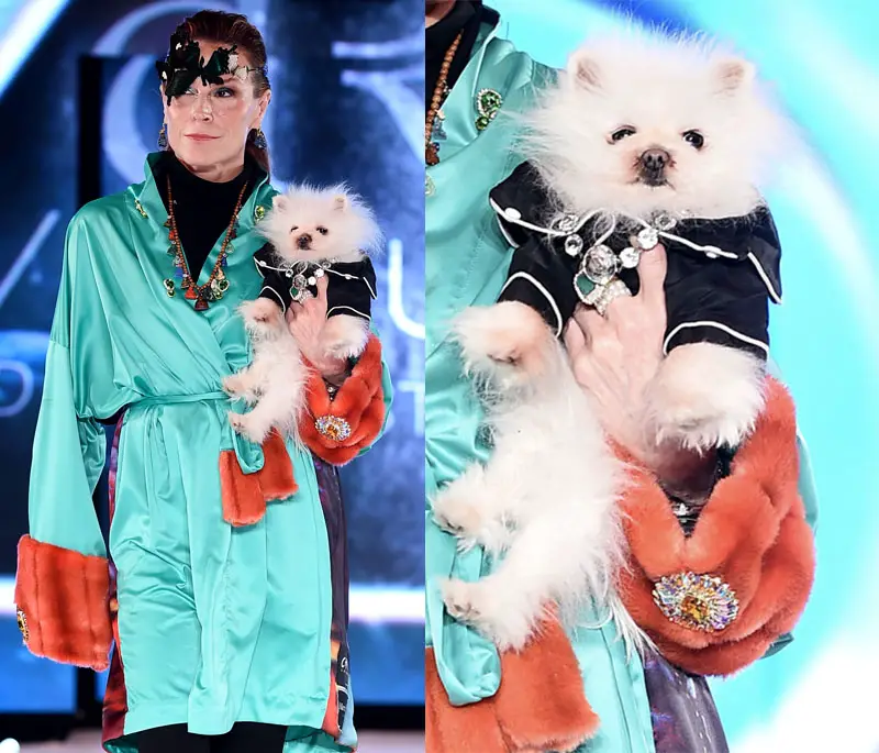 model holding white pom