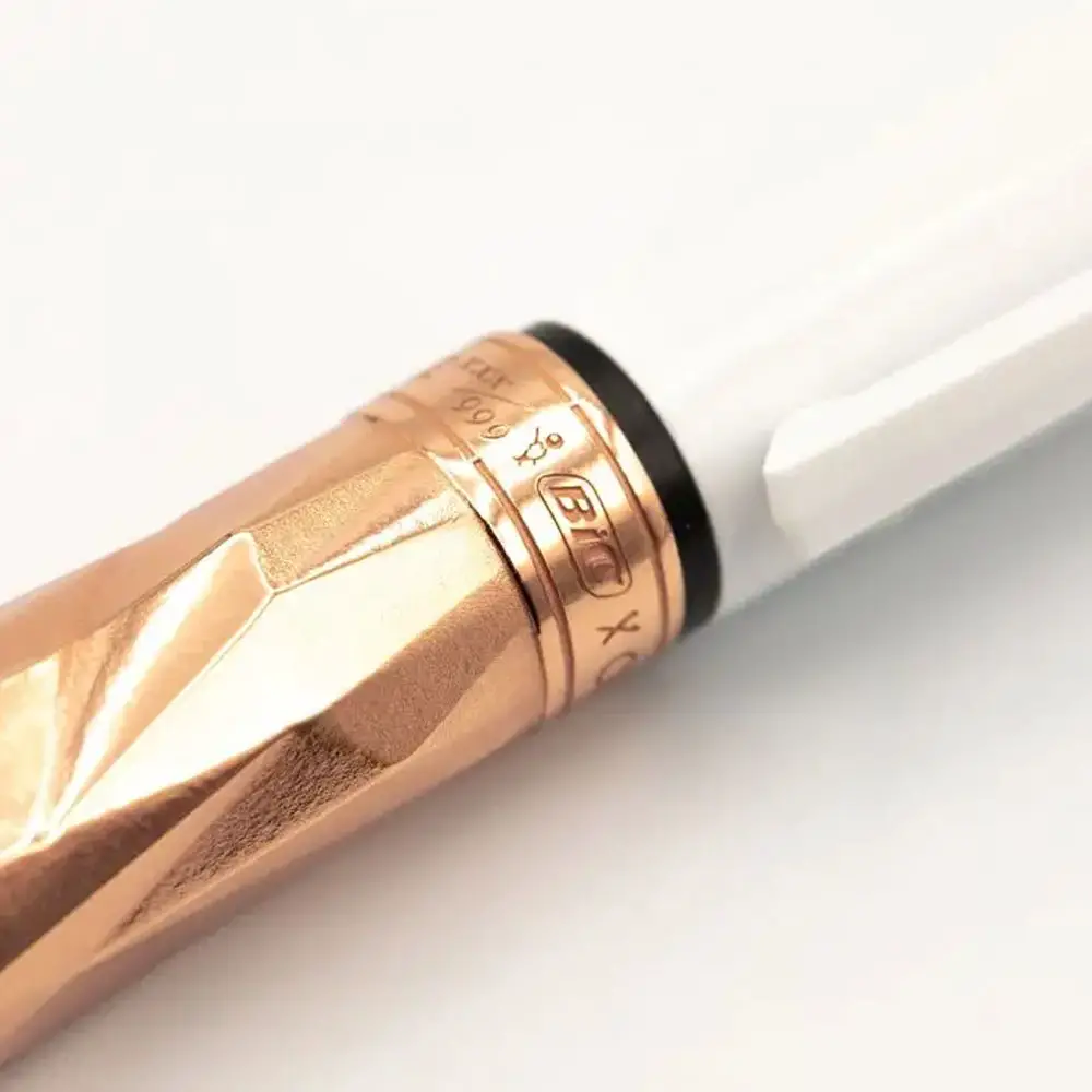 orlinski x bic x tournaire rose gold-plated bronze 4 color pen detail