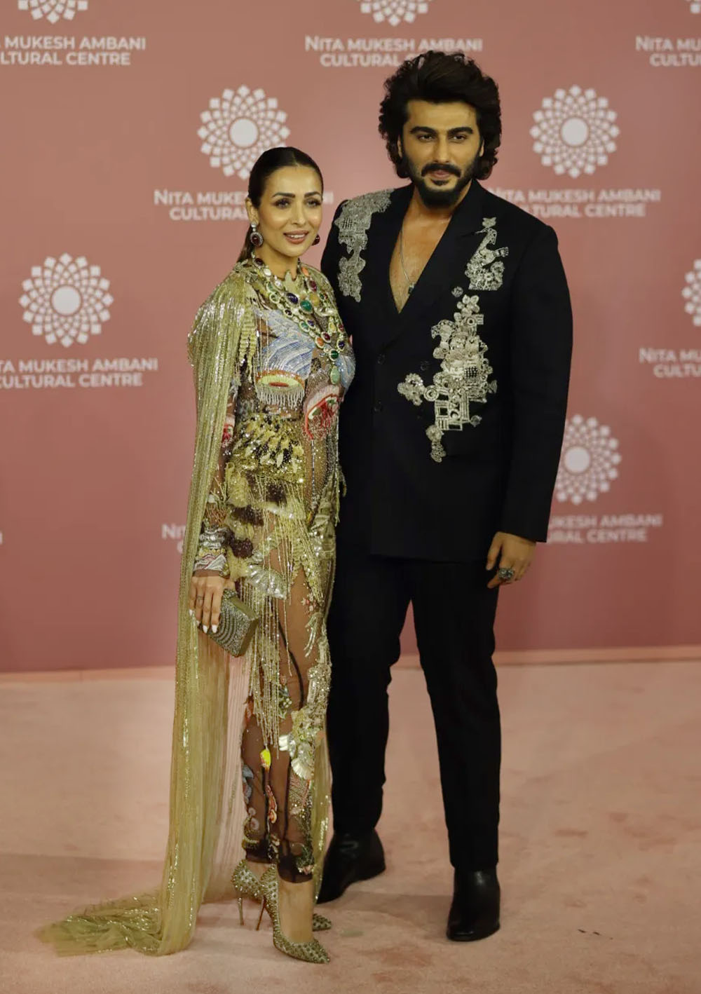 Malaika Arora (in Rahul Mishra) and Arjun Kapoor