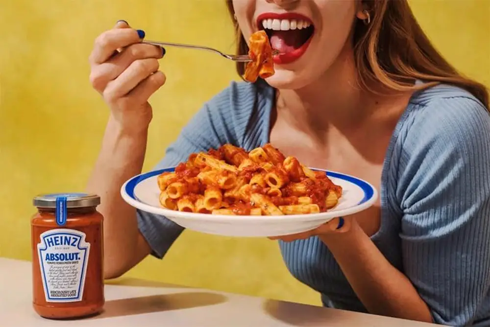 heinz absolut vodka pasta sauce woman eating