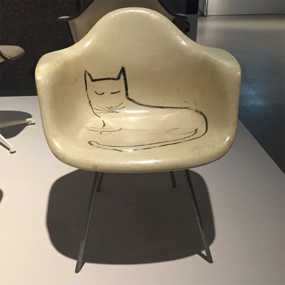 the original saul steinberg cat on eames chair