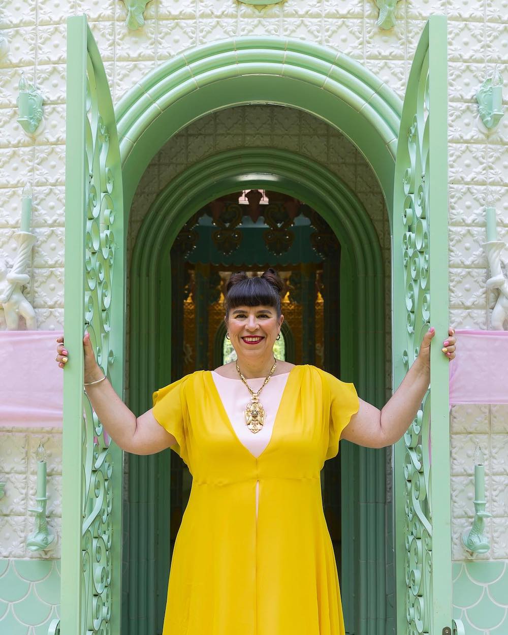 Artist Joana Vasconcelos inside her Wedding Cake Pavilion