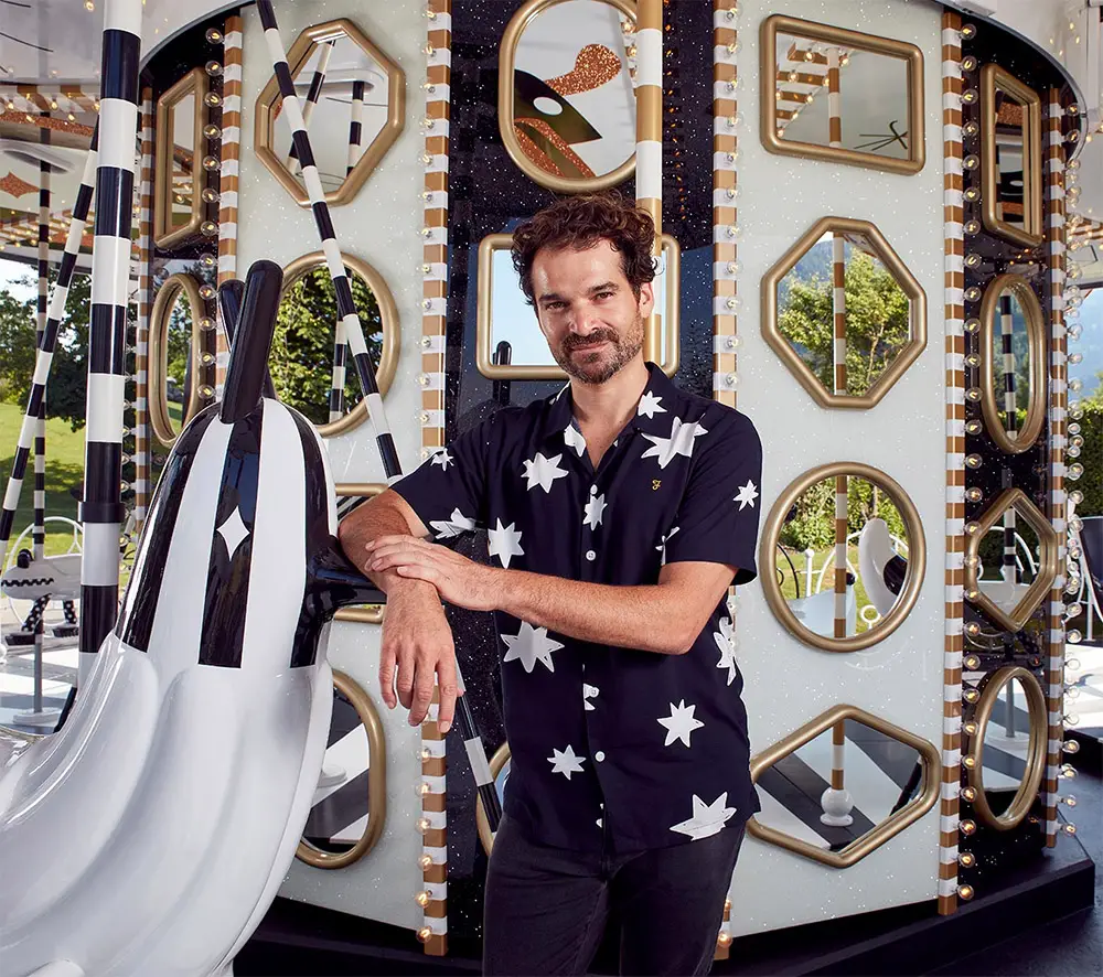 Designer Jaime Hayon with his Carousel for Swarovski