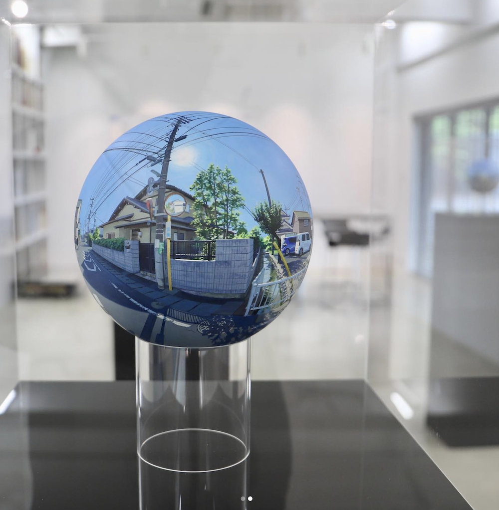 landscapes painted on spheres
