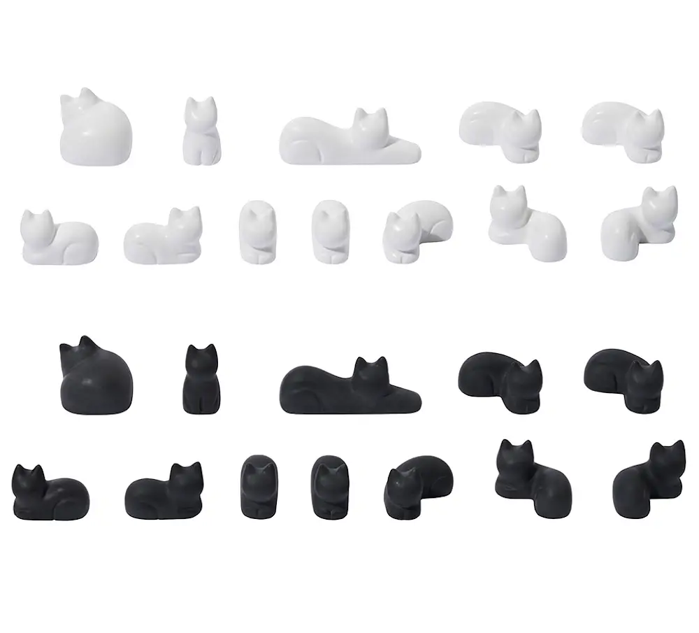 black and white cat game pieces
