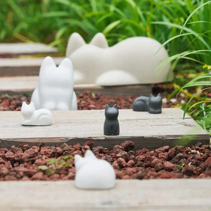 plaster cat sculptures