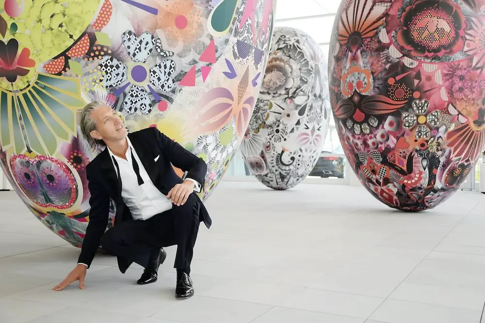 Artist Marcel Wanders with his egg-shaped inflatable objects